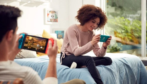 Nintendo Switch Lite Turquoise + Super Mario Bros. Wonder 4 Nintendo Switch Lite Turquoise + Super Mario Bros. Wonder - Afbeelding 4